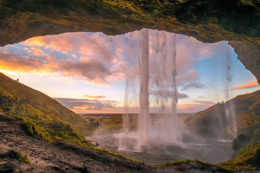 Sunset View From Behind Seljalandsfoss Most Famous Waterfall In iceland