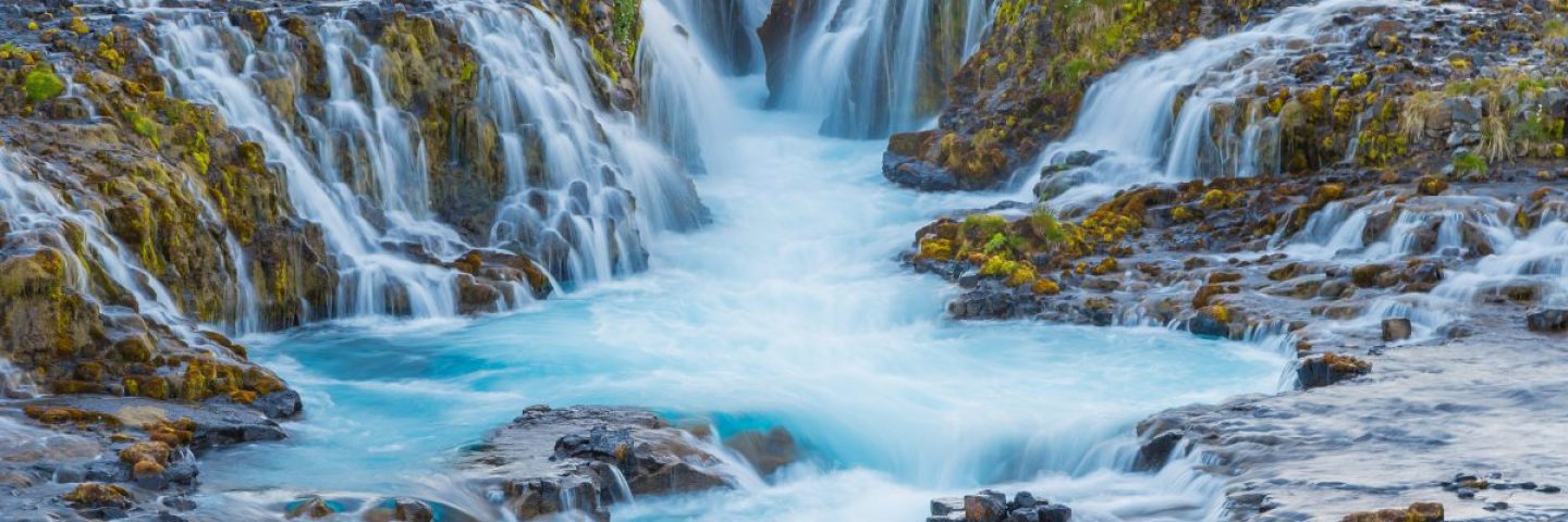 Bruarfoss waterfall shows beautiful blue colors